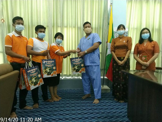 Donation of Oramin-C soft capsules to the volunteers from Mandalay Orthopaedic Hospital